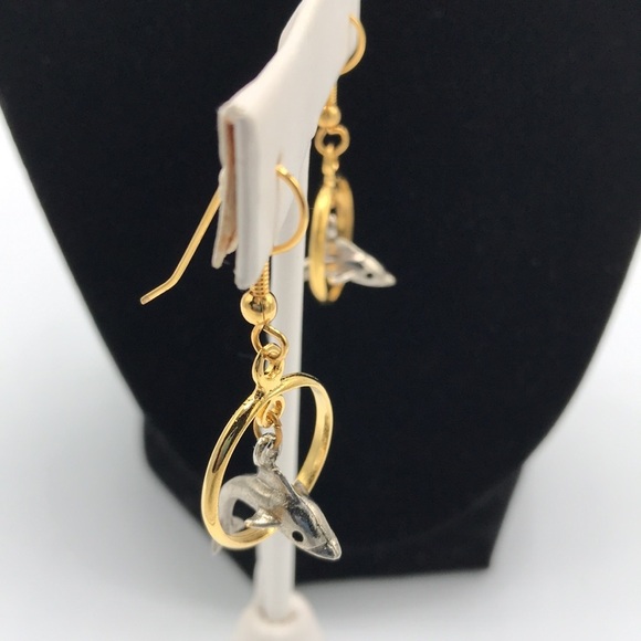 Silver tone dolphin jumping through gold tone hoop earrings - Picture 5 of 6